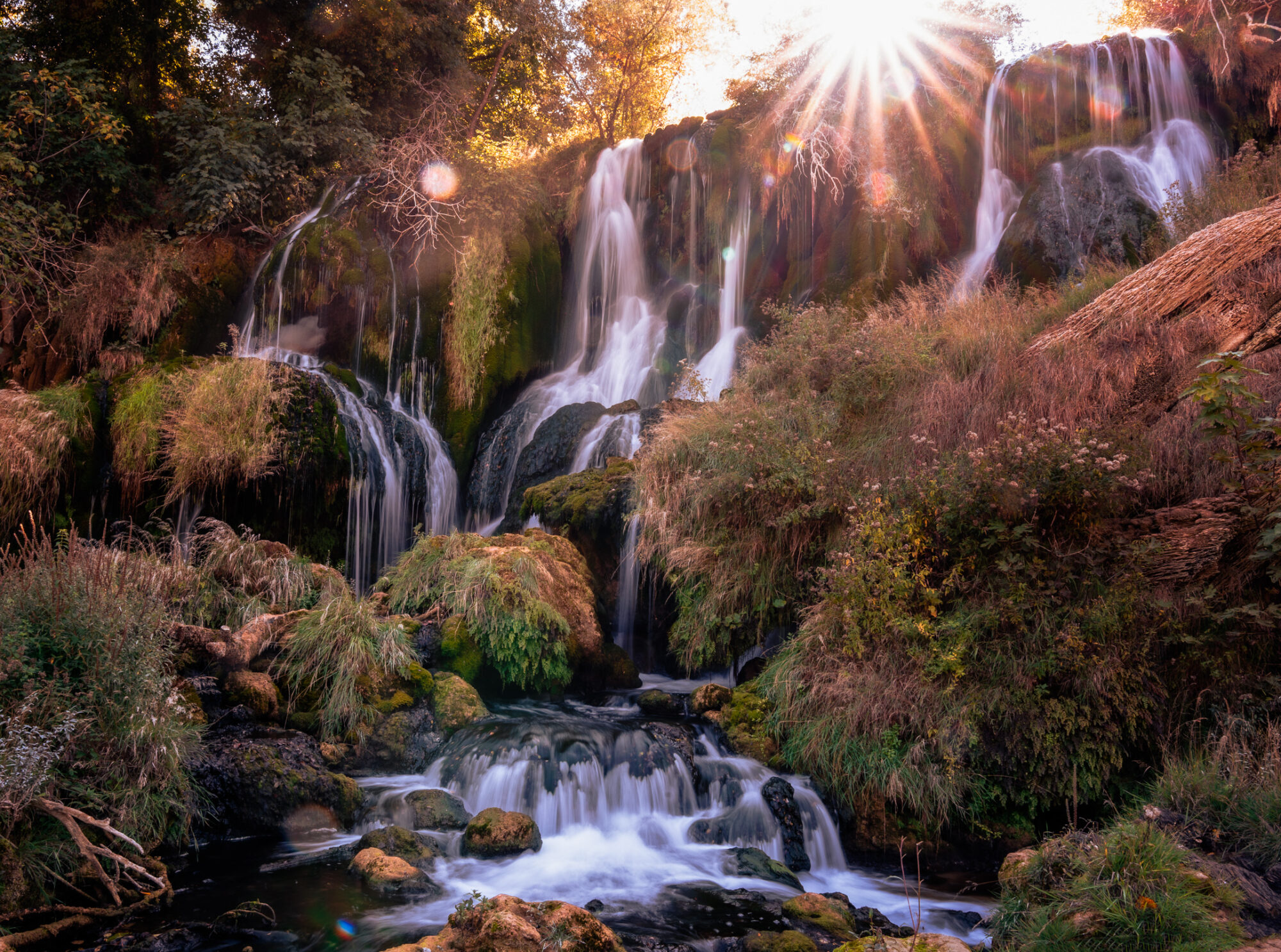 Kravice Waterfall with sun in frame