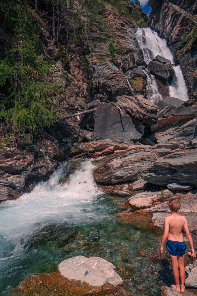 Gran-Paradiso-National-Park-Family-road-trip-in-Northern-Italy-Lillaz-Waterfalls-go-for-a-swim