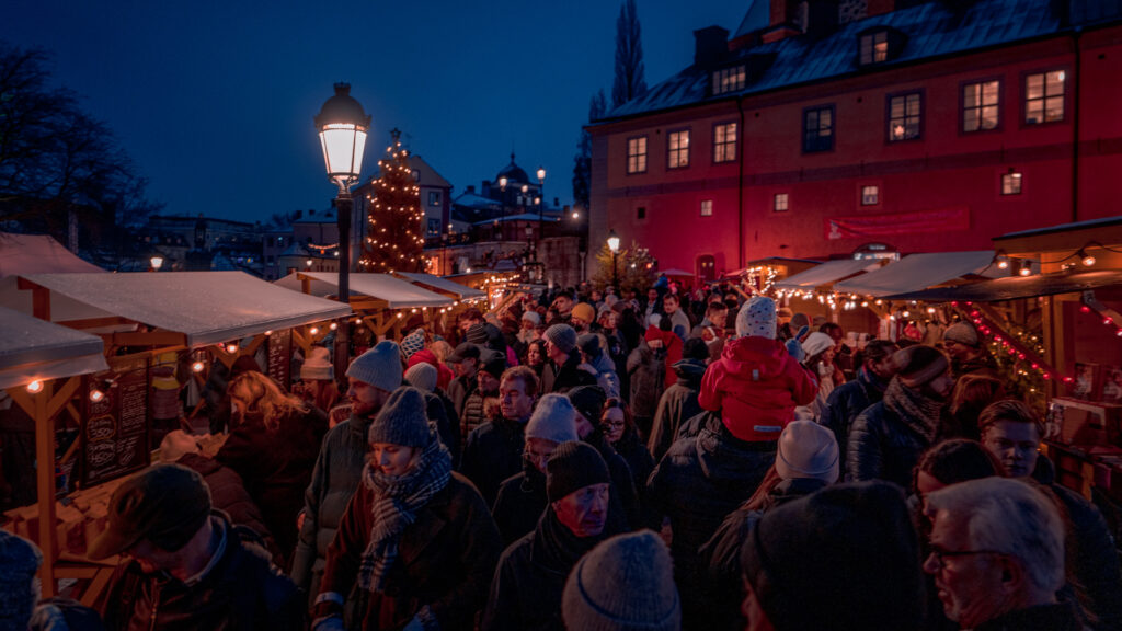 Christmas Market in Sweden - Christmas Tree Market Stalls Cosy Crowd - Uppsala Historiska Julmarknad