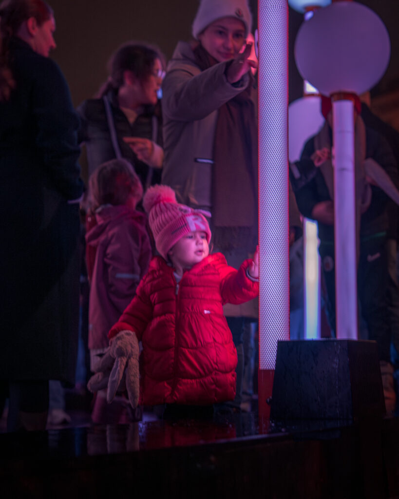 Nobel Week Lights 2025 Stockholm - Glow - Child Touching Art