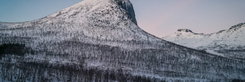Segla Mountaint - Senja Scenic Road - Winter Mountain Drone Shot