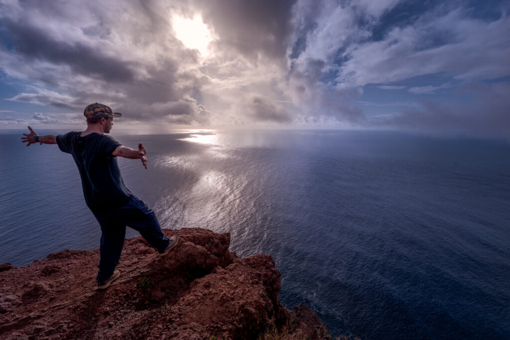 Miradouro Farol Da Ponta Do Pargo Viewpoint Sunset - Traveller on the edge of Steep Cliff - Self Portrait