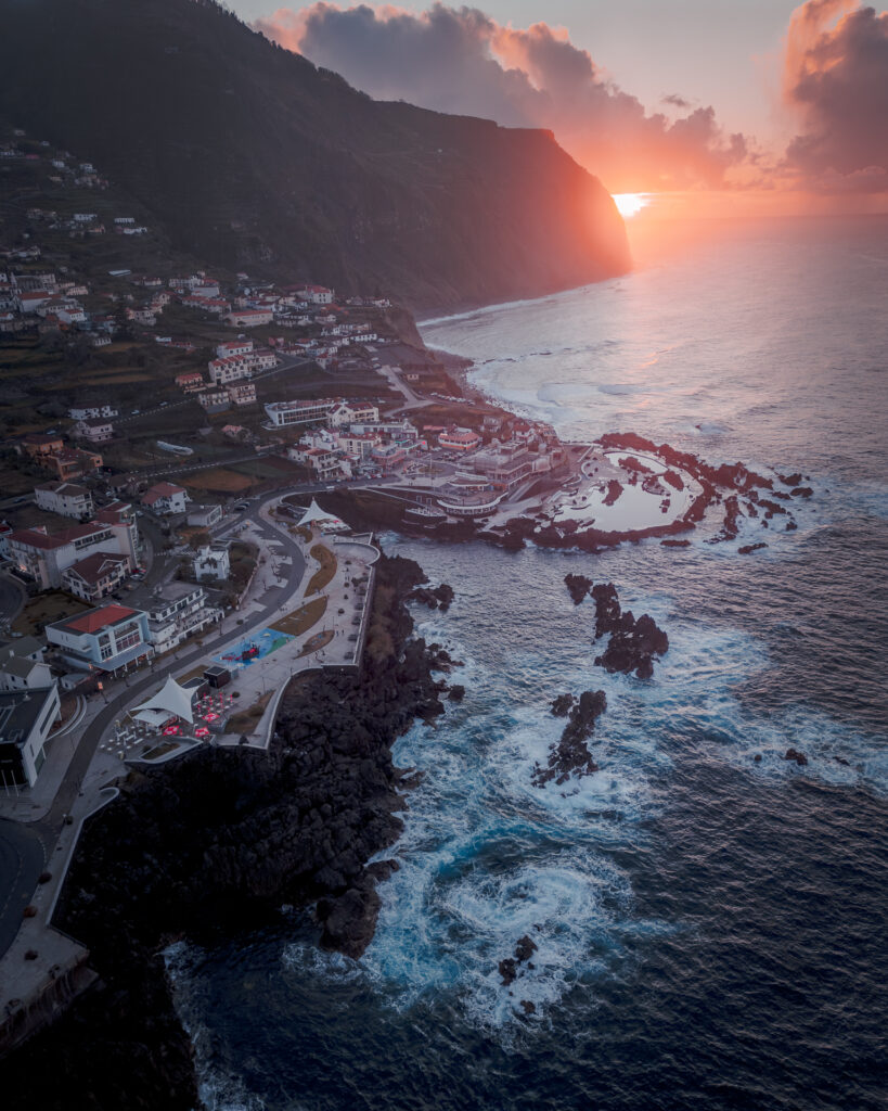 Porto Moniz Natural Swimming Pools Maderia - Ocean and Pools at Sunset - Drone Shot