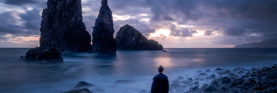 Praia da Ribeira da Janela Madeira near Porto Moniz - Great Sunrise Spot -Traveller in front of Cliffs