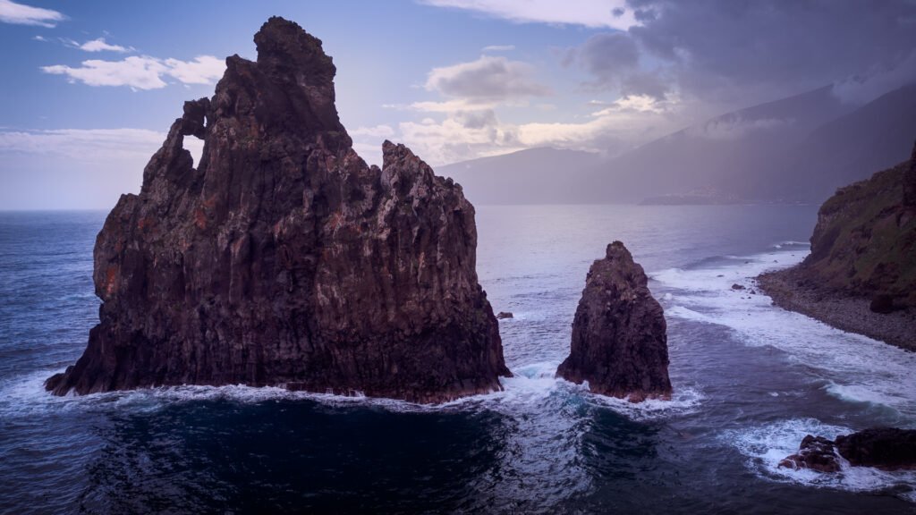 Praia da Ribeira da Janela Madeira near Porto Moniz - Great Sunrise Spot - Windy Ocean in arouind Steep Cliffs - Drone Shot