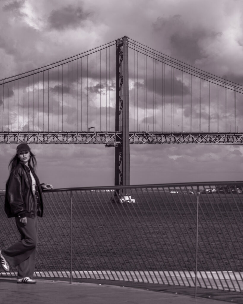 25 April Bridge - Girl at View from MAAT Roof - Lisbon Portugal