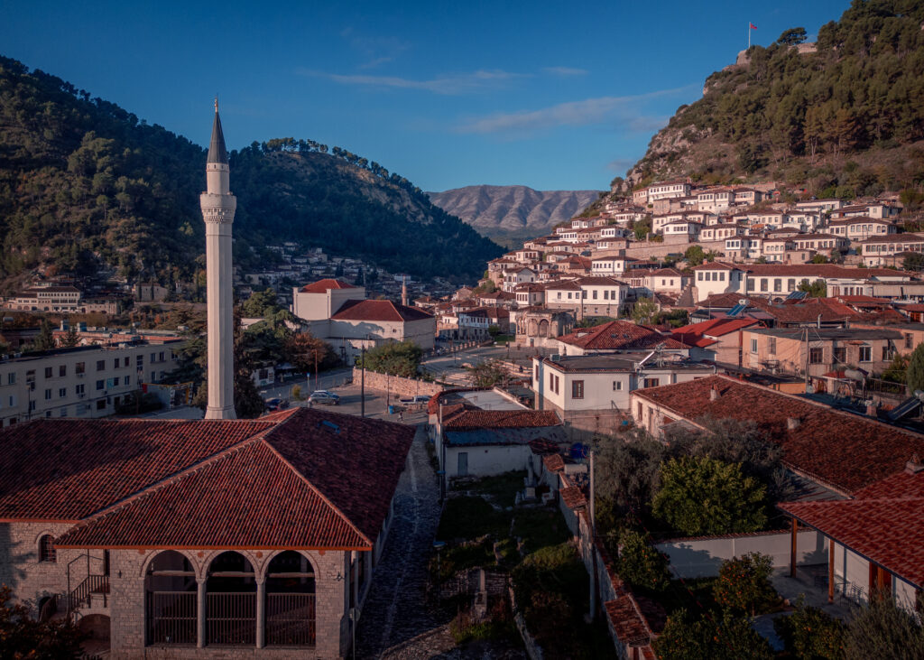 Bachelors Mosque Sunrise at Berat City in Albania with Mountain Backdrop - Drone Shot - Balkan Photography Roadtrip