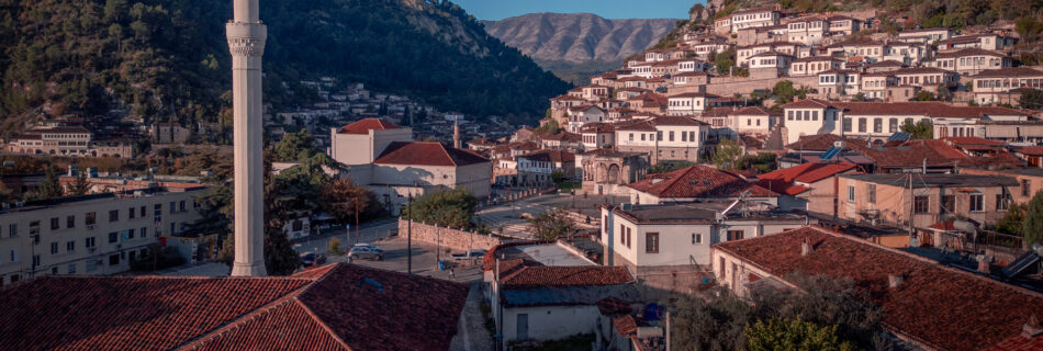 Bachelors Mosque Sunrise at Berat City in Albania with Mountain Backdrop - Drone Shot - Balkan Photography Roadtrip