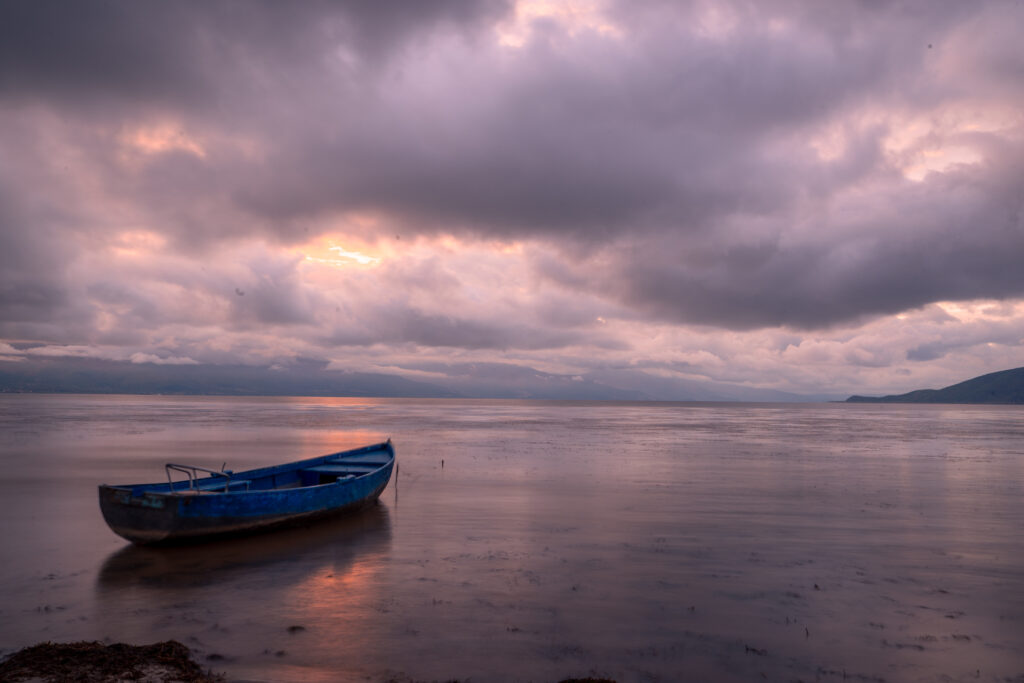 Boat at Sunset at Prespa Lake -  North Macedonia - Photography Road Trip in the Balkans